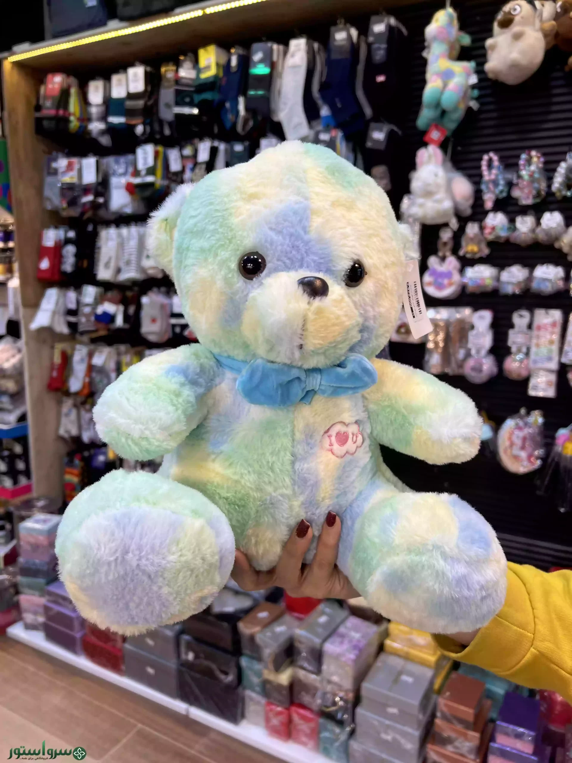 عروسک خرس آب رنگی رنگ آبی و سبز